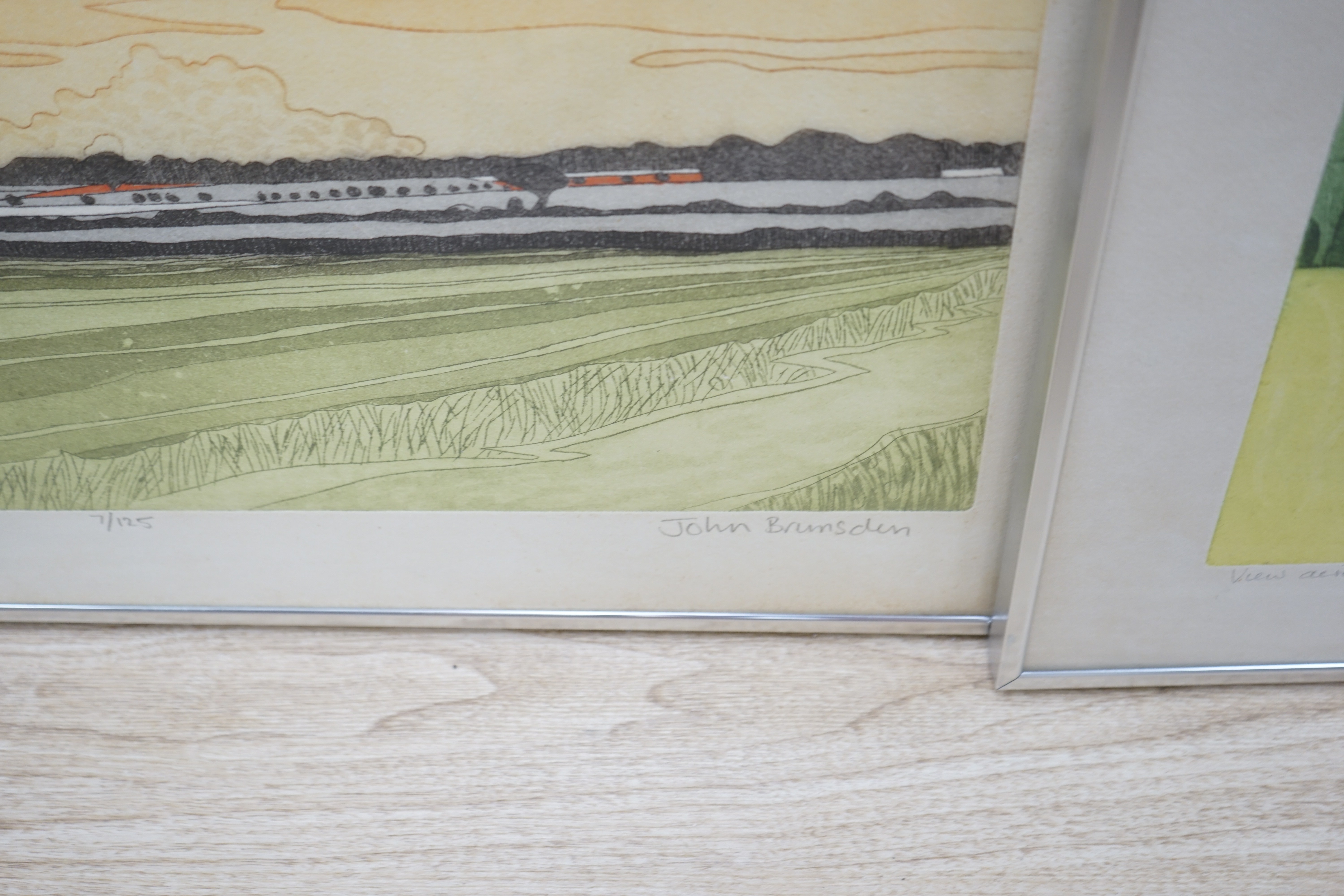 John Brunsdon (1933-2014), near pair of etchings with aquatint, 'A view across the Gower Peninsula and ‘Suffolk Scene’, each limited edition, signed in pencil, largest 55 x 70cm. Condition - fair, some discolouration and